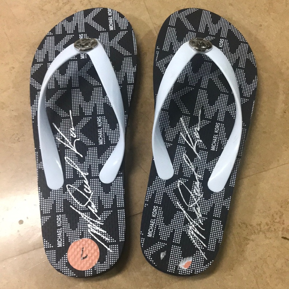 Michael Kors flip-flops silver emblem sandals size 7